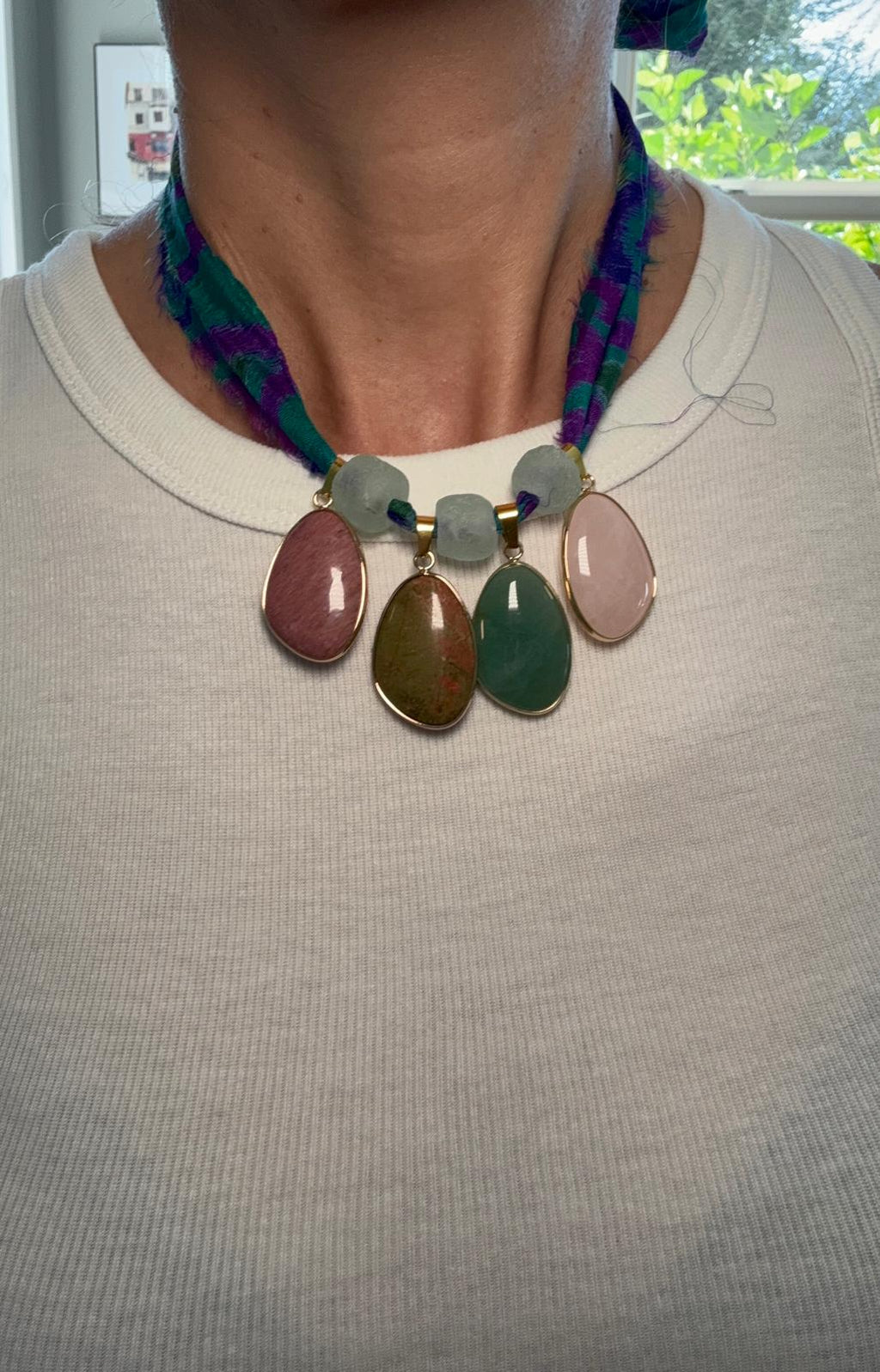 The full necklace with the sari silk ties extended
