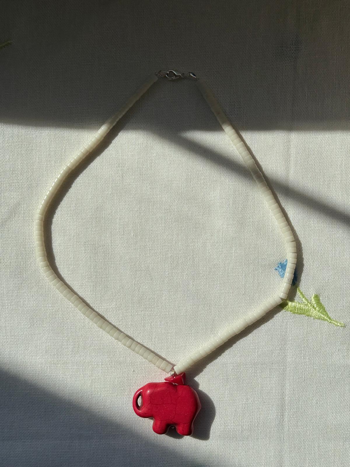 Little Elephant · No. 024 — Howlite elephant pendant, five palettes