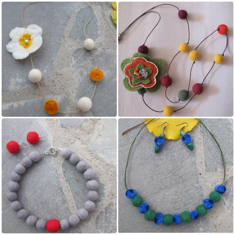 Felted jewellery from Nuvell's first year, 2009 — necklaces and earrings made from felt beads, with a felt flower brooch