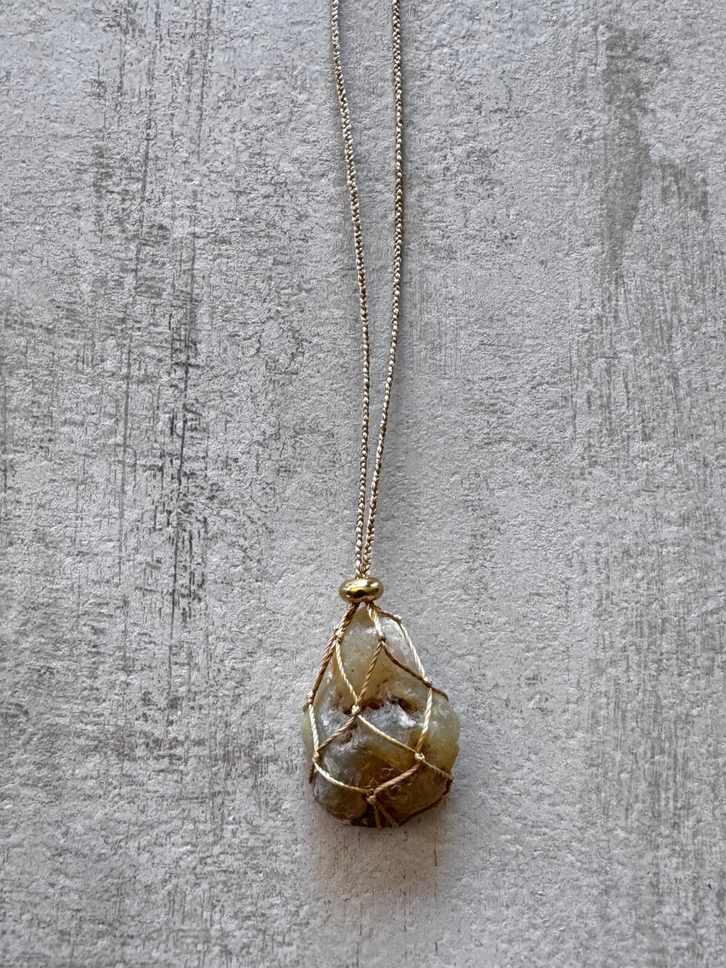 Pod · No. 082 — Raw grey agate, hand-braided