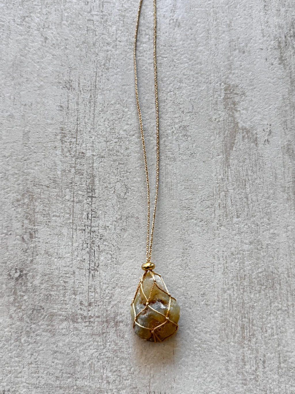 Pod · No. 082 — Raw grey agate, hand-braided