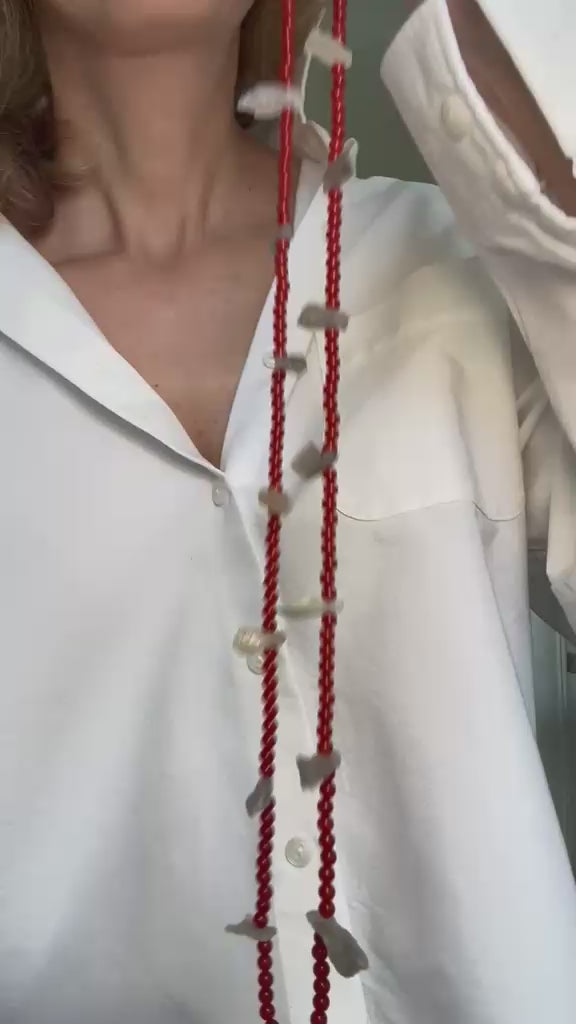 Video of the carnelian and raw labradorite necklace moving, the labradorite catching blue light