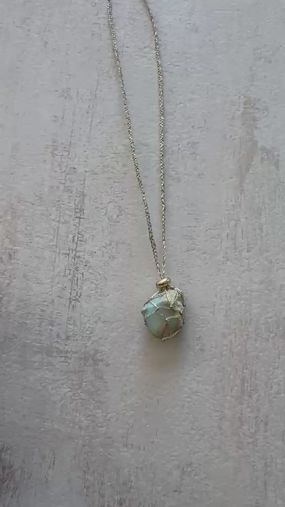 Video of the raw opal pendant turning in the light