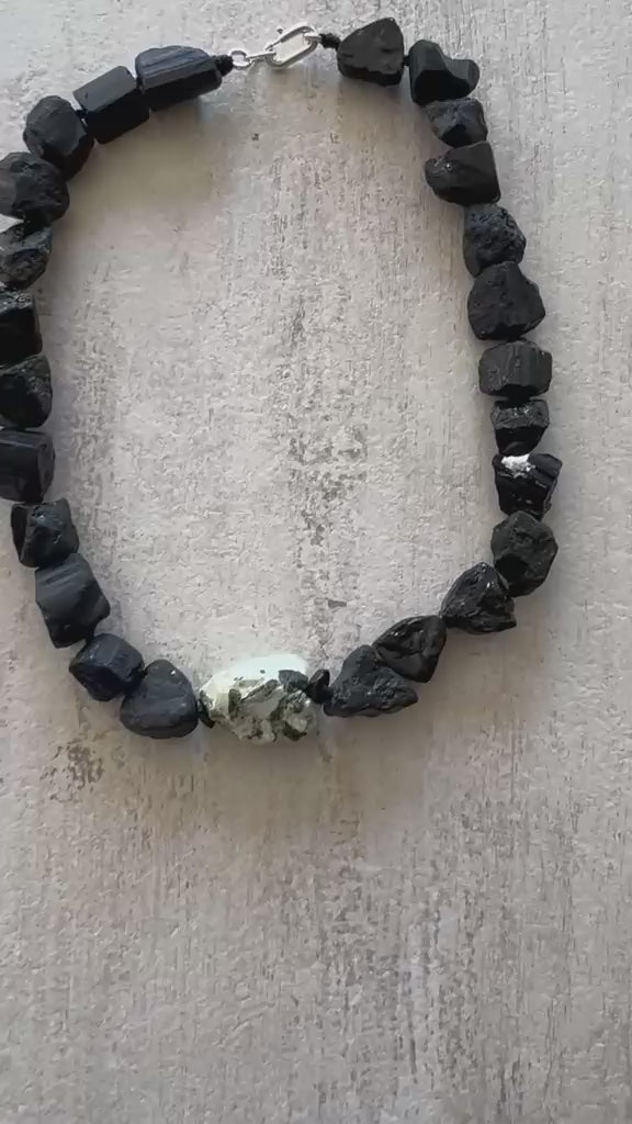Video of the raw black tourmaline collar turning in the light