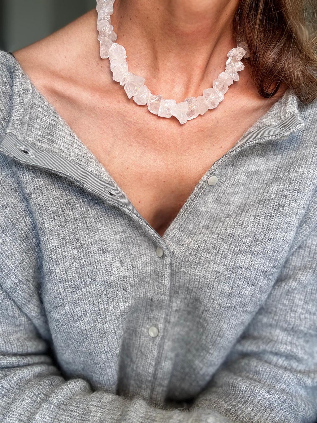 Close view of the collar worn plain, every quartz chunk a different broken shape